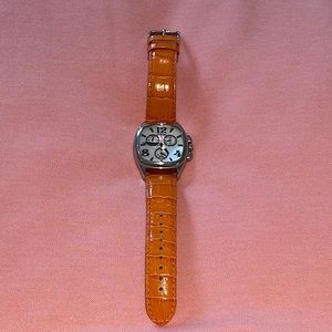 Women’s Honora pearlescent watch with Orange genuine leather strap.